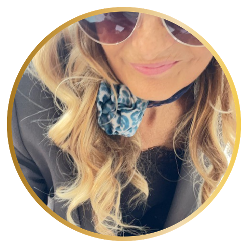 Renata Hellier, Milan-based global fashion stylist and creator of Ignite Your Dream Diva, smiling confidently in Milan, Italy